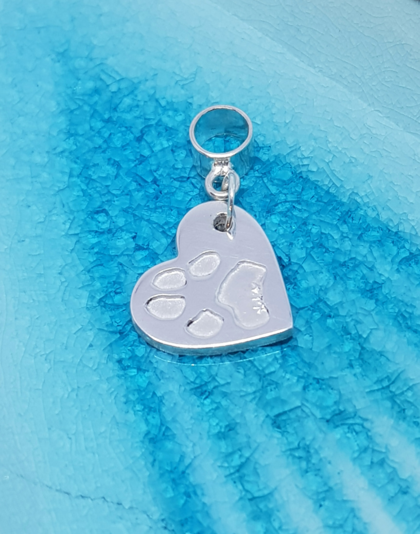 Paw print heart silver charm on carrier